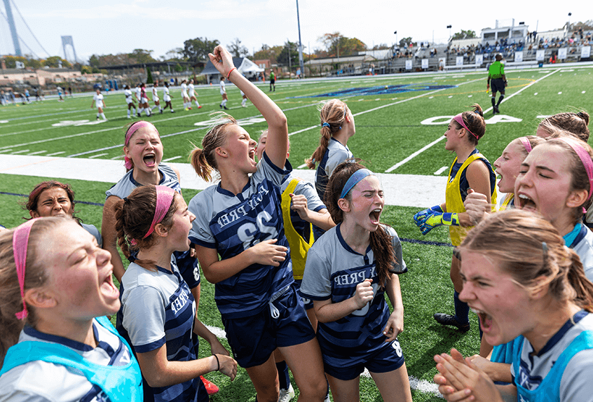 Girls Soccer Team cheering